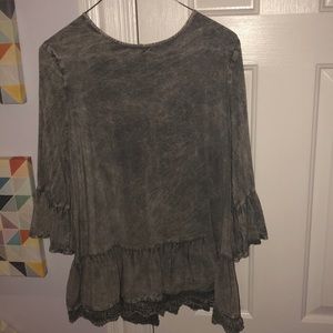 Grey shirt, open back, design on bottom of shirt